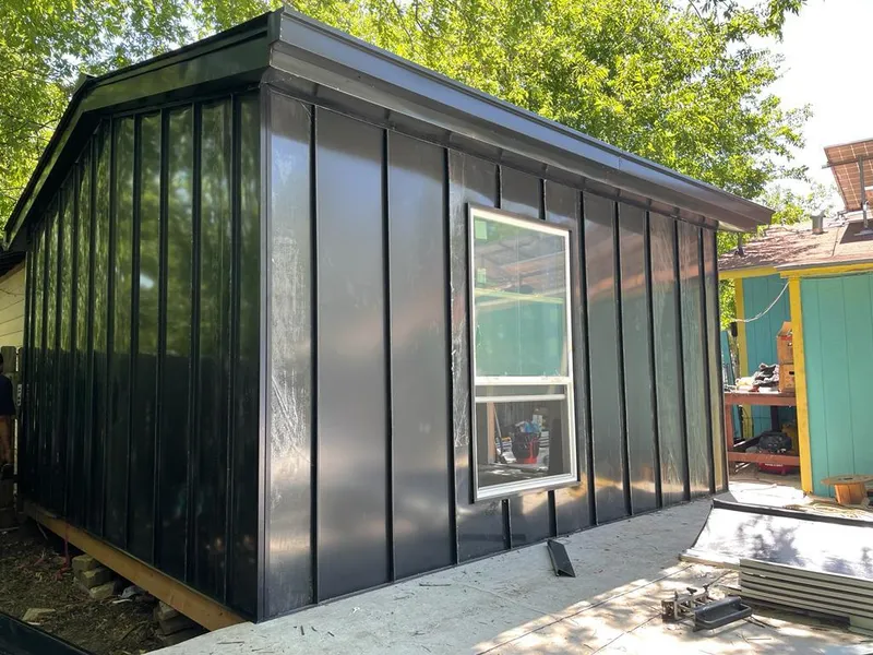 Black standing seam metal wall panels for Metal Roof Installation in North Caldwell