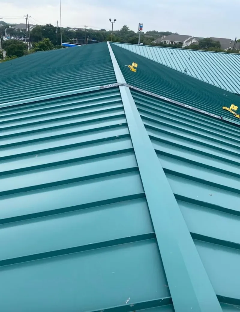 Green commercial metal roof ridge and valley for Metal Roof Repair in North Caldwell