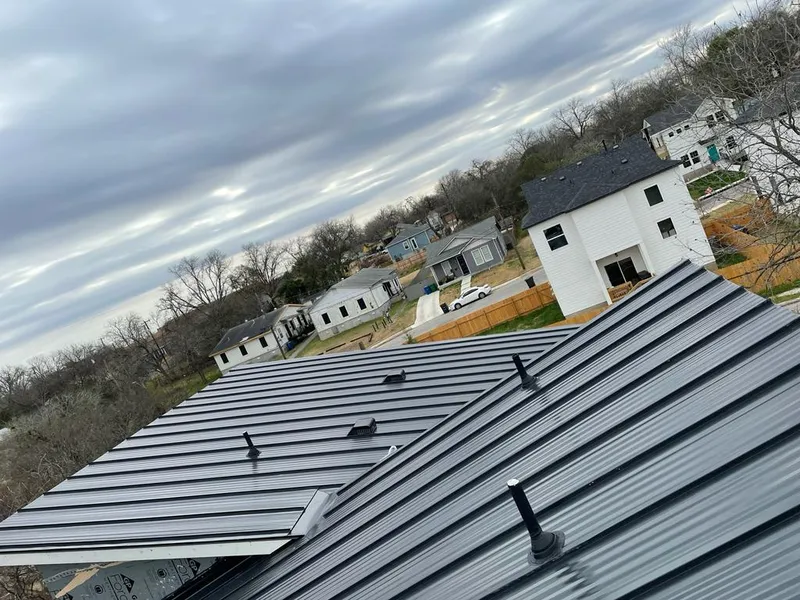 Standing seam metal roof panels with vents for Skylight Repair in North Caldwell